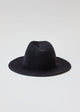 Back of black velour brimmed hat