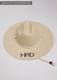 Surfer style sun hat with black embroidered letters