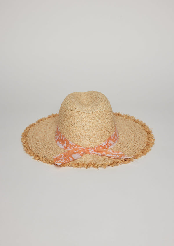 Back view of straw hat with fringe detail on brim and orange floral fabric trim