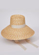 Large brimmed sun hat with ivory ribbon on angle