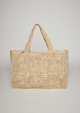 Straw tote with intricate design detail and hat loop