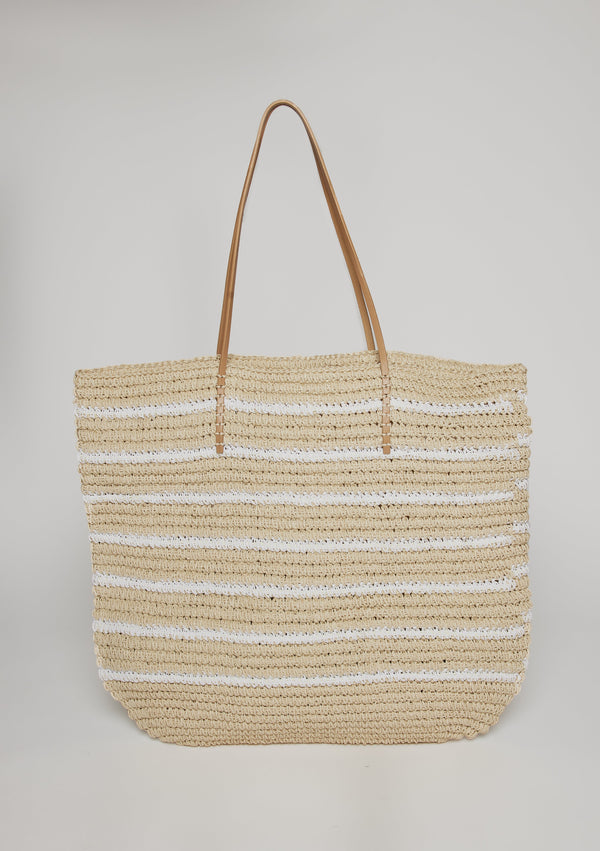 Straw tote with white stripes and leather handles