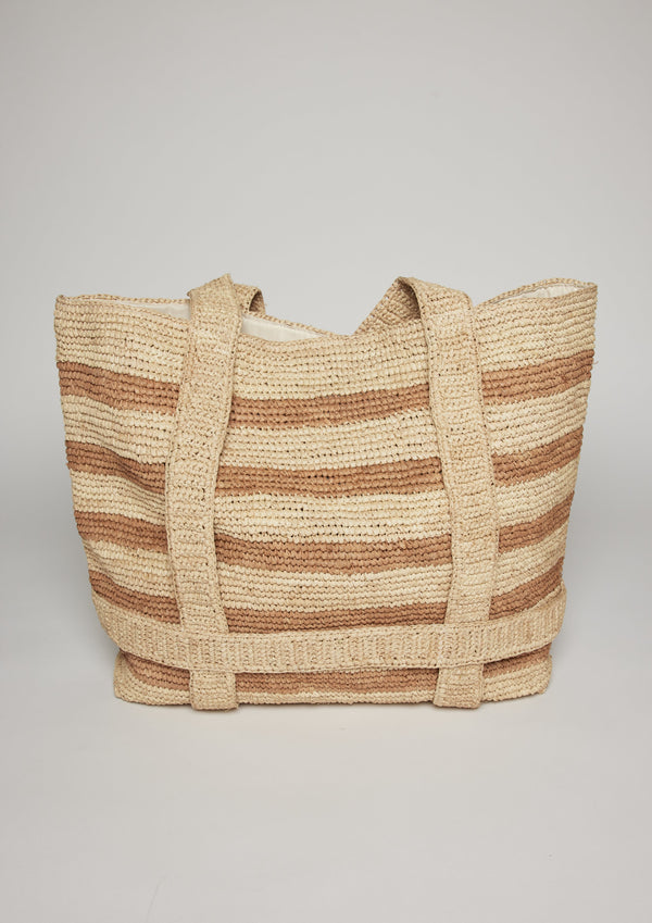 Tan striped straw tote with straps for hat