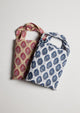 Blue and white and pink and tan sarong bags