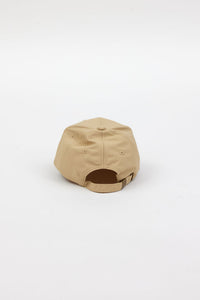 bottom of tan rain cap