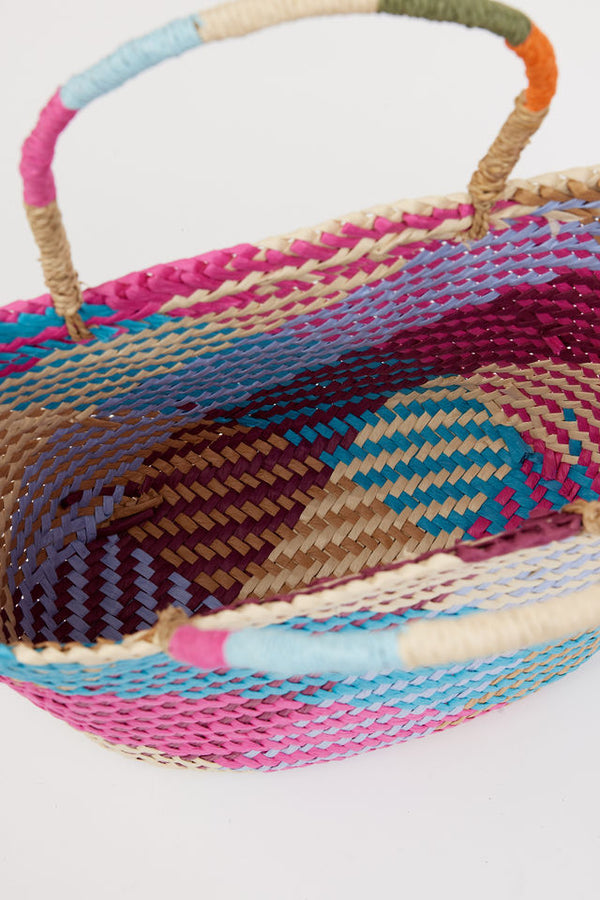 inside of multi colored straw tote