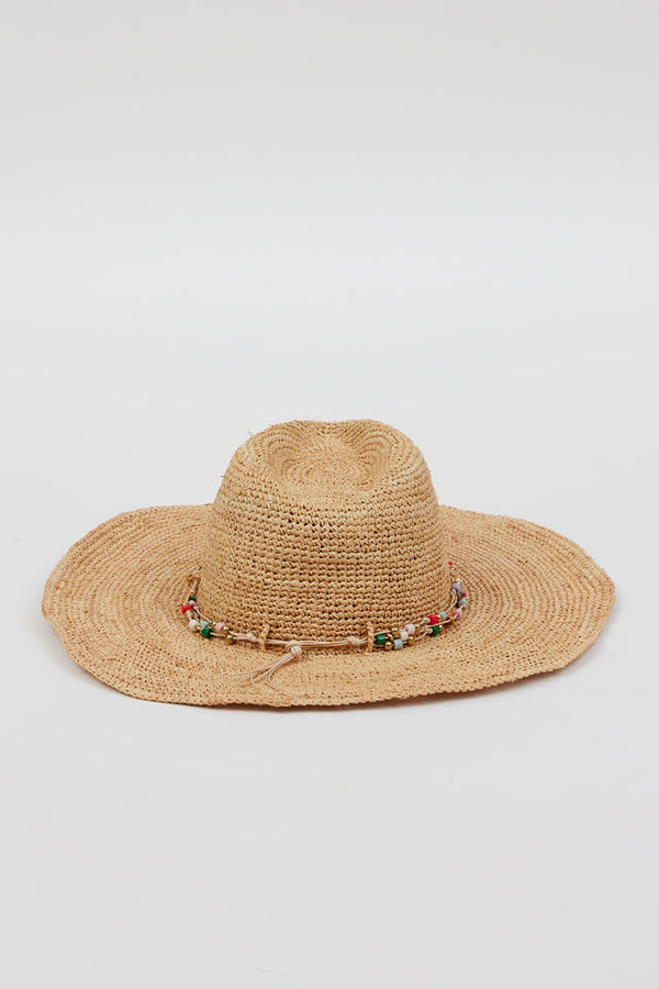 back of tan woven sunhat with multi colored beaded trim