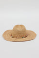 back of tan woven sunhat with multi colored beaded trim