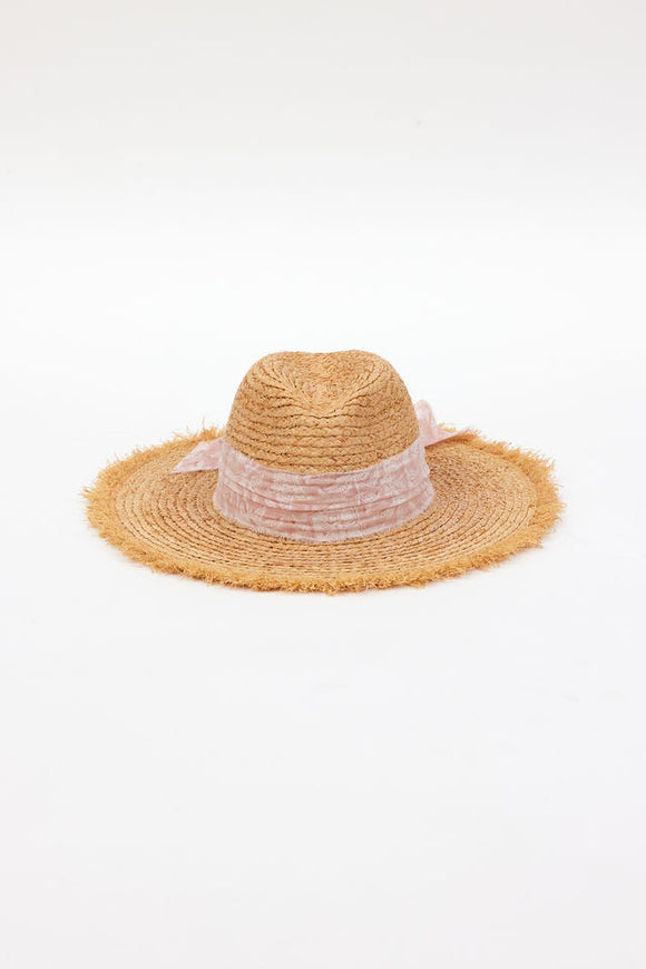 front of braided raffia sunhat with pale pink floral trim