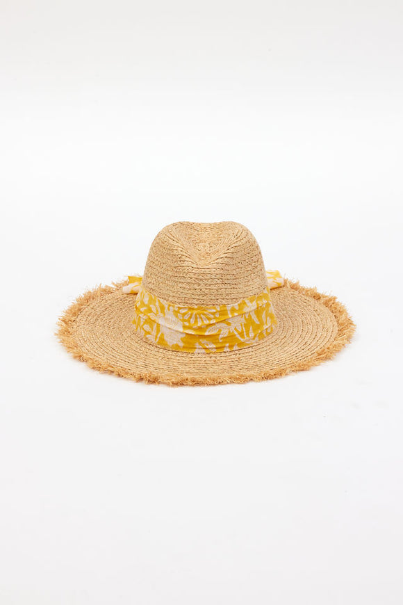 front of braided raffia sunhat with yellow floral trim