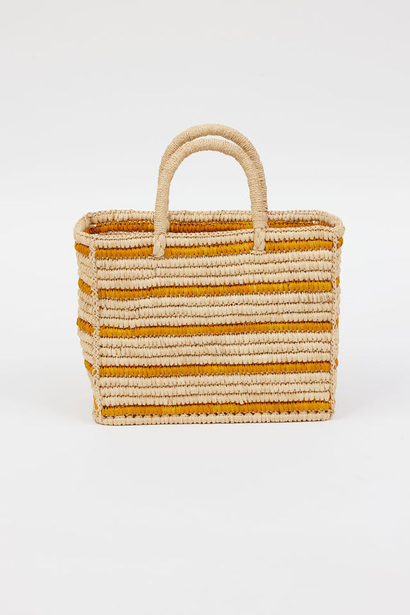 light tan straw bag with brown stripes