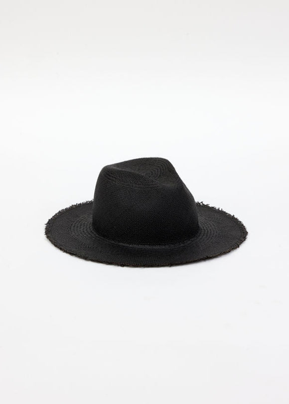 3/4 angle of black straw panama hat with fringe