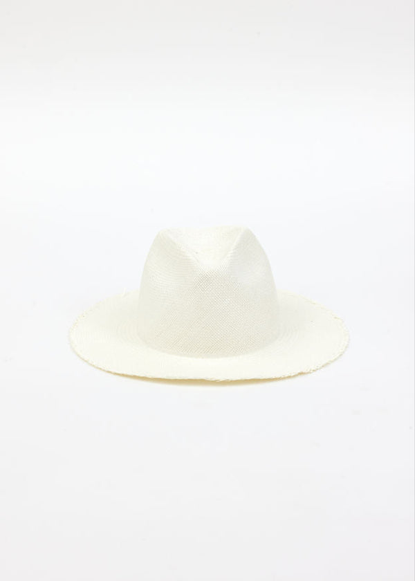 front of white fringed panama hat