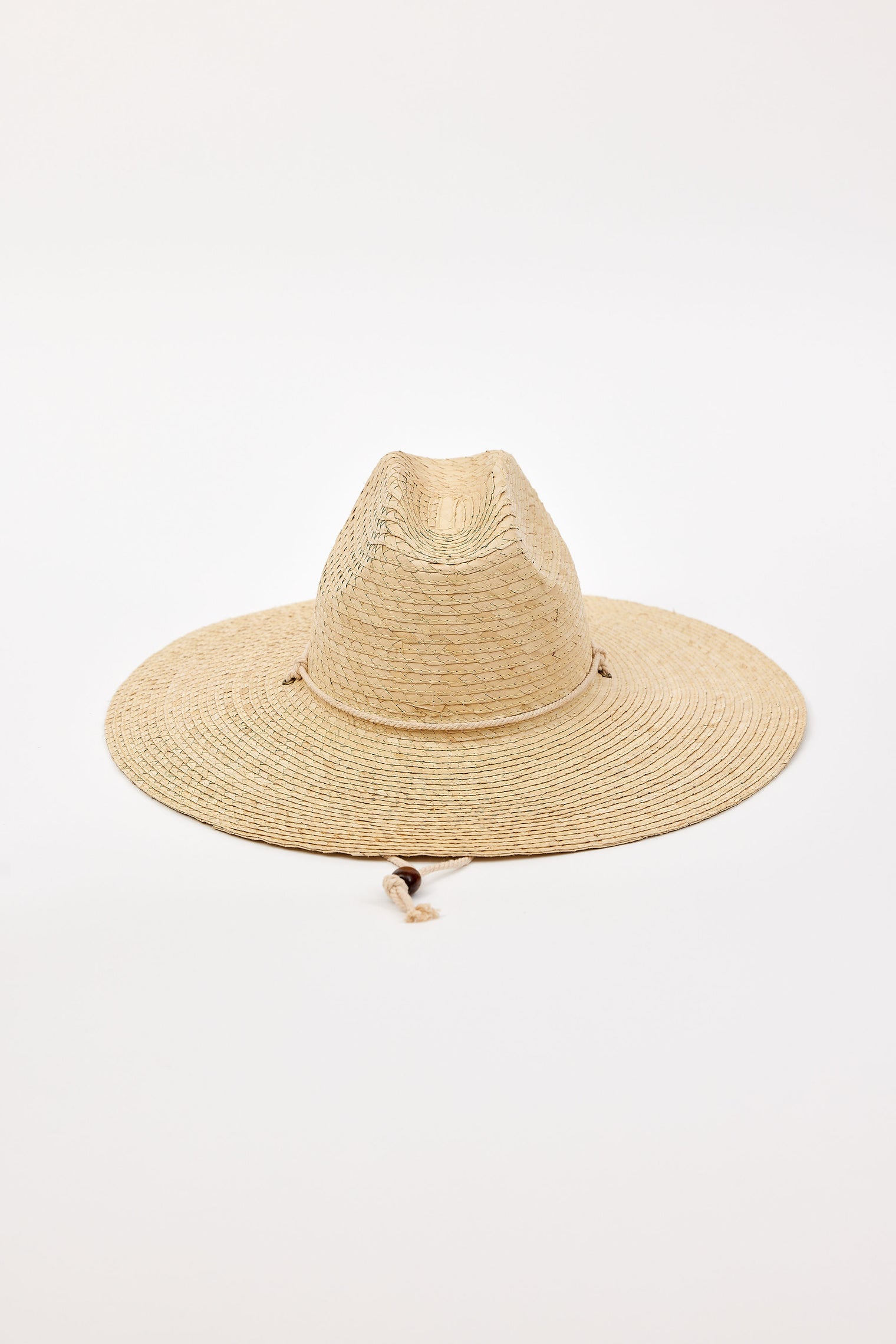 Beige straw hat on a white background