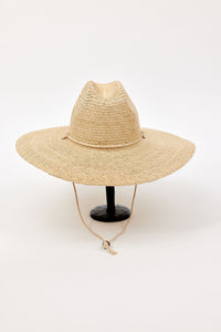 Beige straw hat on a white background