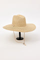 Beige straw hat with a chinstrap on a white background