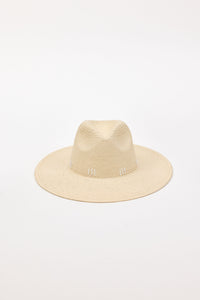 Beige straw hat on a white background