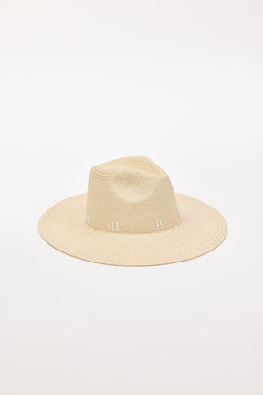 Straw sunhat with a white stitch detail on a light gray background