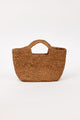 Brown straw woven handbag on a white background