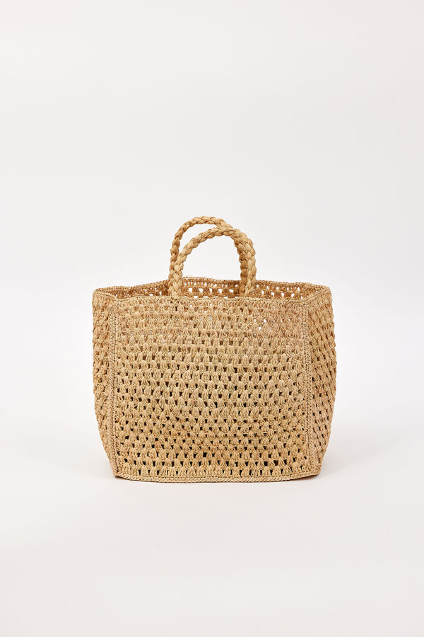 Woven bag with handles on a white background