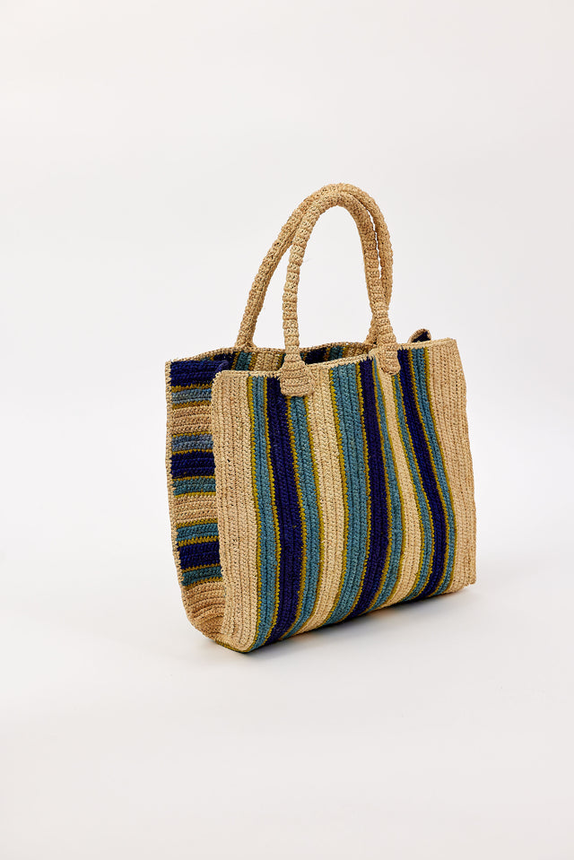Woven handbag with striped pattern on a white background
