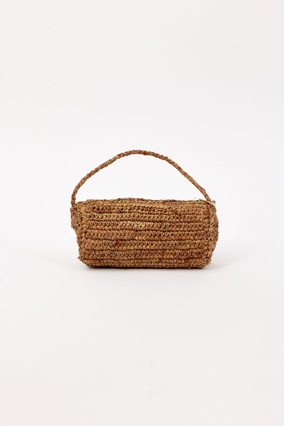 Brown woven handbag with handle on a white background