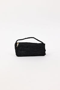 Black woven handbag on a white background