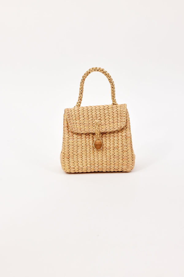 Woven handbag with a handle on a white background