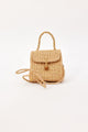Woven straw handbag with a strap on a white background