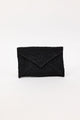 Black woven envelope clutch on a white background
