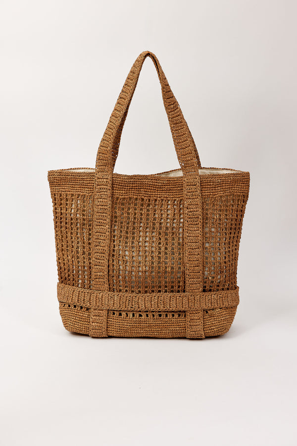 Brown straw bag with straps to hold a hat