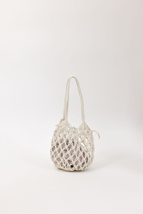 Open weave handbag with a handle on a white background