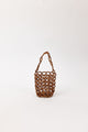 Brown beaded handbag on a white background