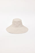Beige wide-brimmed bucket hat on a white background