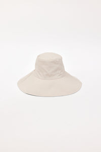 Beige wide-brimmed bucket hat on a white background
