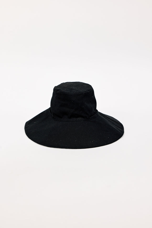 Black bucket hat on a white background