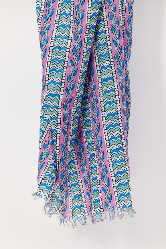 Colorful patterned scarf with blue, pink, and green design on a white background