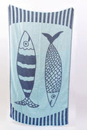 Towel with fish design on a light blue background