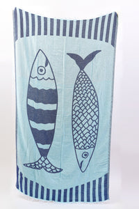 Towel with fish design on a light blue background