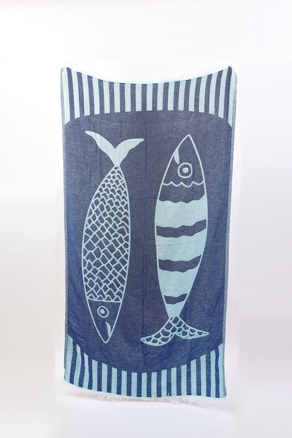 Towel with fish design and striped border on a white background