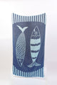 Towel with fish design and striped border on a white background