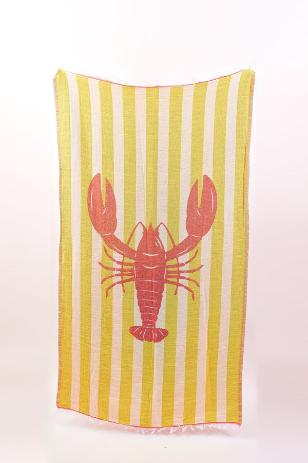Striped towel with a red lobster design on a white background