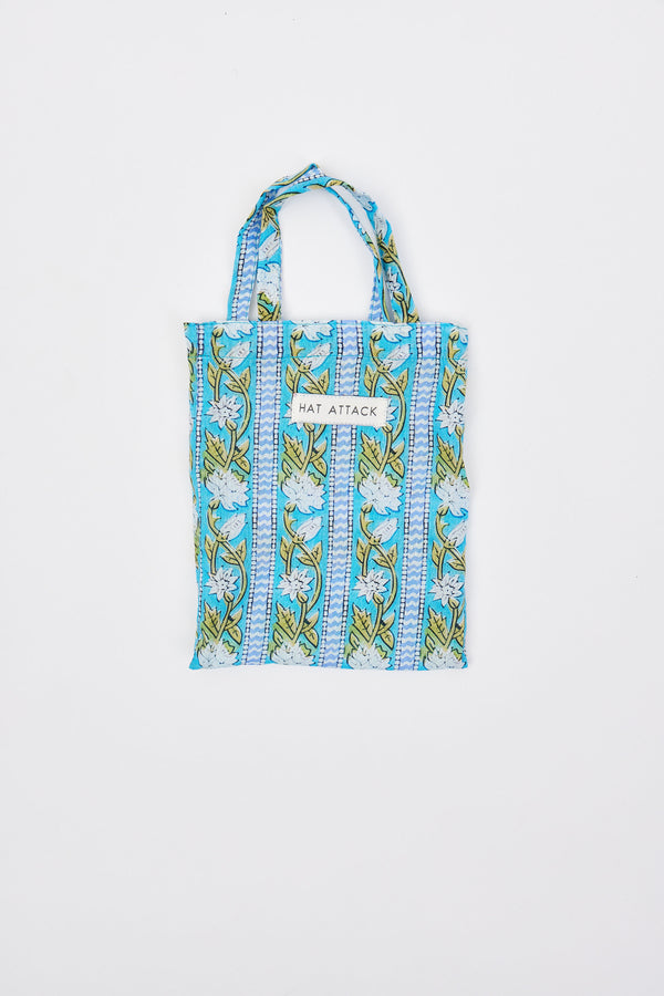 Mini bag with floral pattern and 'Hat Attack' logo on a white background