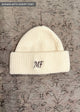 ivory beanie with script font embroidery