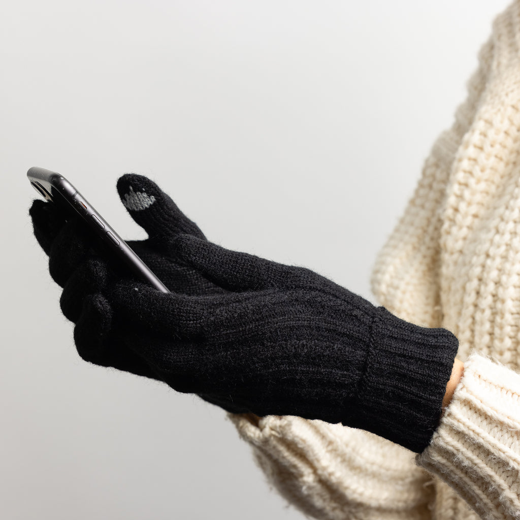 Cable Knit Touch Screen Glove holding phone