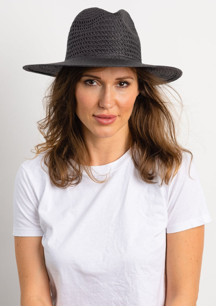 Vented Sun Hat in black on model looking at camera