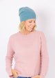 Cashmere Slouchy Cuff beanie in marine blue on model in pink sweater