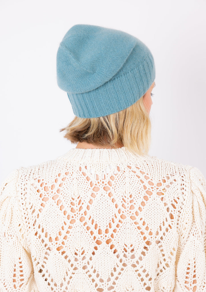 Cashmere Slouchy Cuff beanie in marine blue on model from back