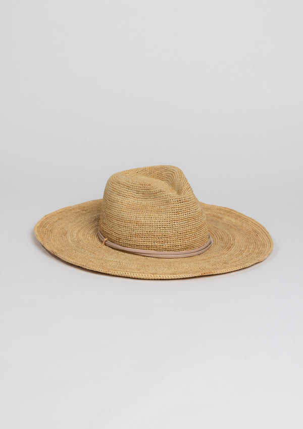 3/4 angle of raffia straw continental sunhat with tan trim detail