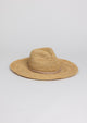 3/4 angle of raffia straw continental sunhat with tan trim detail